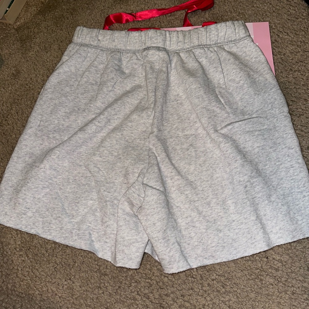 Pink logo dad shorts black and tan are new with tags. Gray is used. - Picture 9 of 10